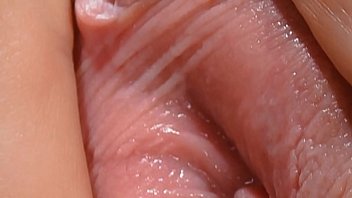 Demonstration of a woman's pussy with a microscopic view